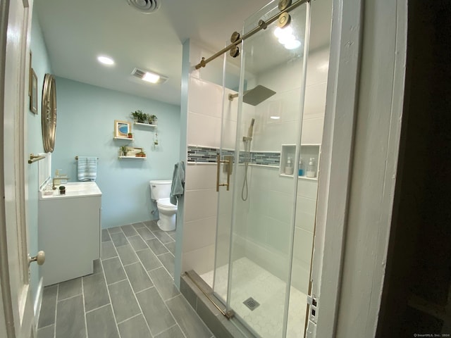 469 Platt Hill Rd, Winchester, CT 06098 - bathroom with vanity, a shower stall, and toilet
