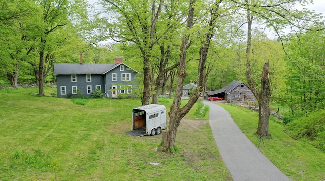 469 Platt Hill Rd, Winchester, CT 06098 - view of front of property featuring a chimney, a front lawn, and driveway