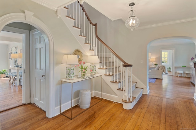 9 High Ridge Rd, Wilton, CT 06897 - interior space with hardwood / wood-style flooring, arched walkways, crown molding, and baseboards