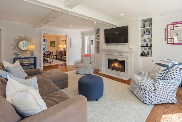 9 High Ridge Rd, Wilton, CT 06897 - living area with a high end fireplace, ornamental molding, wood finished floors, and beam ceiling
