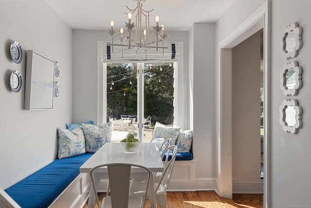 9 High Ridge Rd, Wilton, CT 06897 - dining area featuring wood finished floors and an inviting chandelier