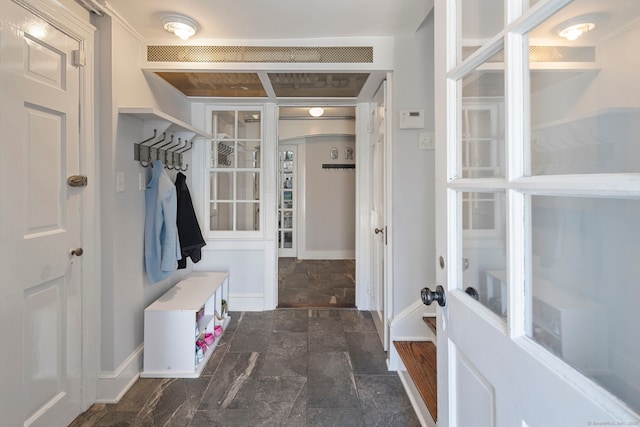 9 High Ridge Rd, Wilton, CT 06897 - mudroom with baseboards, french doors, and stone finish floor