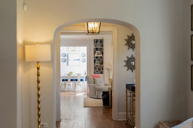 9 High Ridge Rd, Wilton, CT 06897 - hallway featuring arched walkways and hardwood / wood-style floors