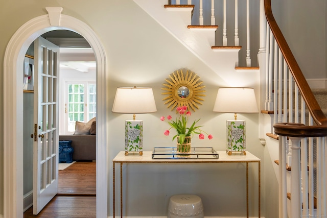 9 High Ridge Rd, Wilton, CT 06897 - hallway with stairway, wood finished floors, and arched walkways
