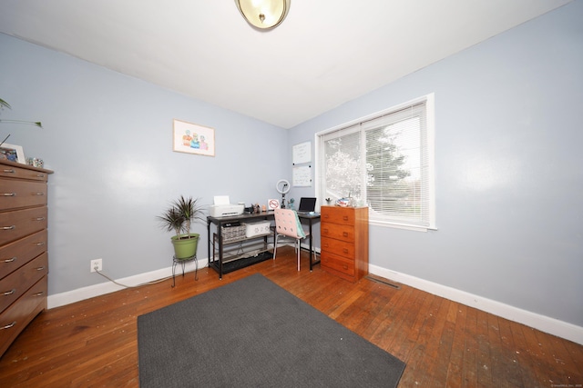 office area with baseboards and hardwood / wood-style floors
