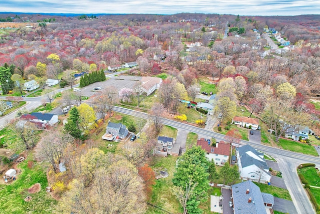 aerial view with a forest view and a residential view