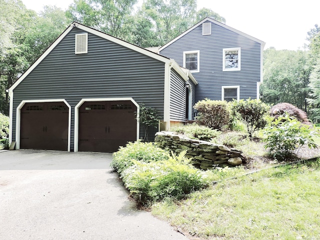 190 Wickham Rd, East Haddam, CT 06423 - view of front of home with an attached garage