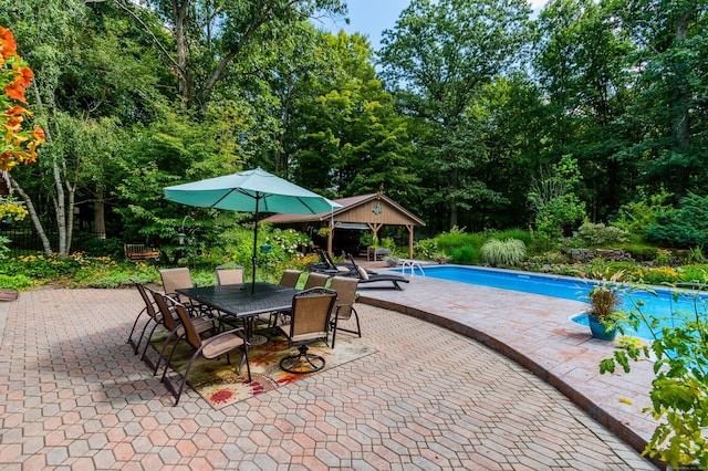 outdoor pool featuring a gazebo and a patio area