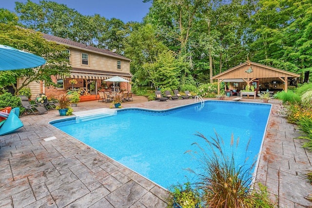 outdoor pool with a patio, a gazebo, outdoor lounge area, and outdoor dining area