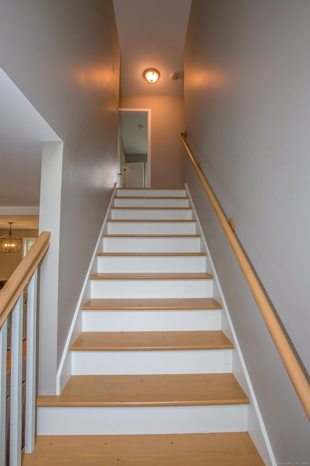 3 Henry Rd, Enfield, CT 06082 - stairway with a notable chandelier