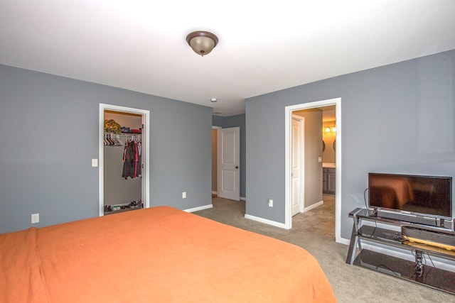 3 Henry Rd, Enfield, CT 06082 - carpeted bedroom with baseboards, a walk in closet, and a closet