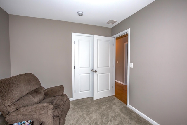 3 Henry Rd, Enfield, CT 06082 - living area featuring baseboards, carpet flooring, and visible vents