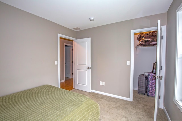 3 Henry Rd, Enfield, CT 06082 - unfurnished bedroom with baseboards, a closet, a spacious closet, and light carpet