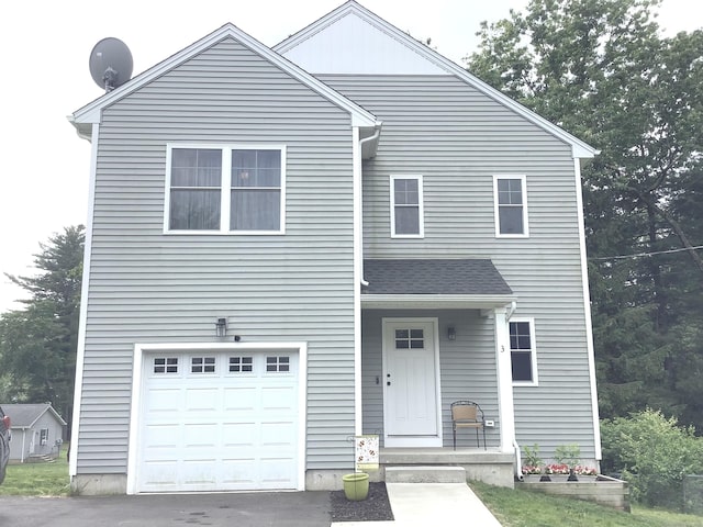 3 Henry Rd, Enfield, CT 06082 - traditional-style house with a garage and a shingled roof