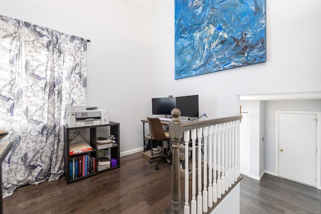 office with baseboards and wood finished floors