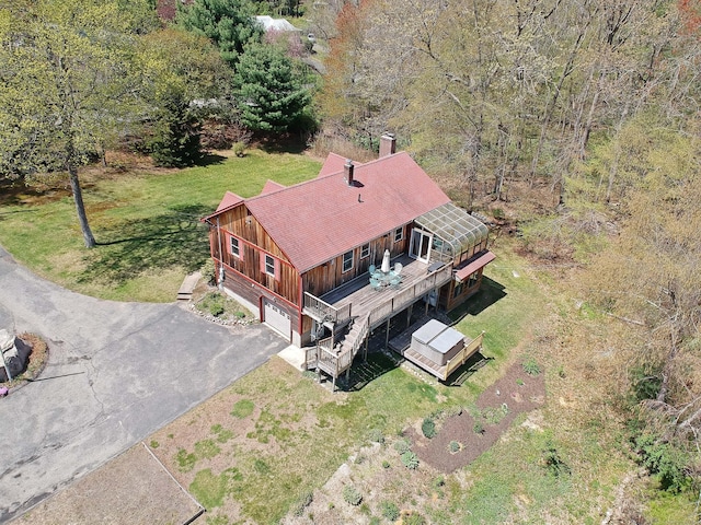 aerial view featuring a wooded view