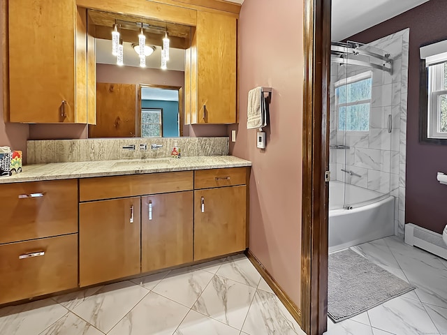 full bath with baseboards, tub / shower combination, marble finish floor, and vanity