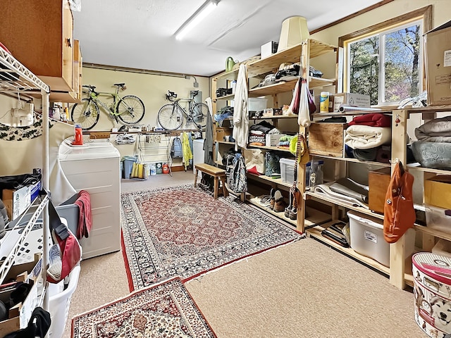 storage area featuring washer / clothes dryer