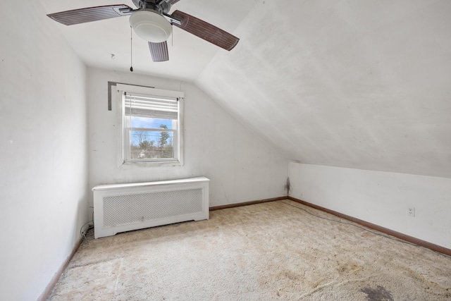 170 Park Rd, Waterbury, CT 06708 - additional living space featuring baseboards, radiator heating unit, a ceiling fan, and lofted ceiling