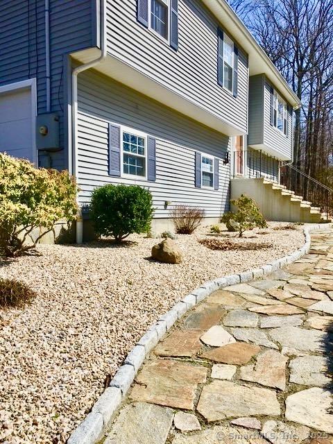 view of property exterior with a garage