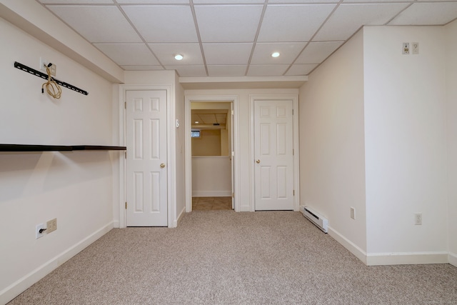 395 Isinglass Rd, Shelton, CT 06484 - empty room with baseboard heating, carpet floors, recessed lighting, a drop ceiling, and baseboards