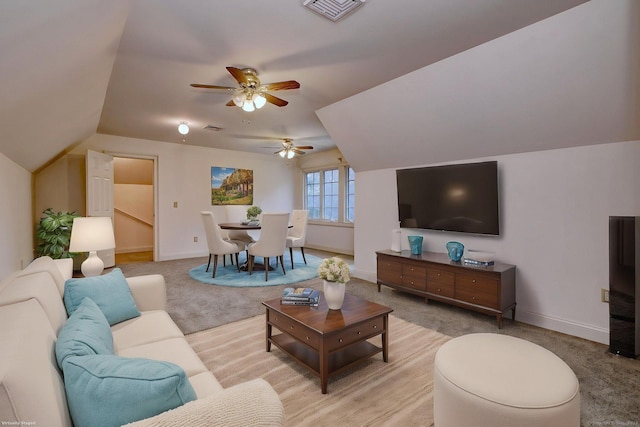 395 Isinglass Rd, Shelton, CT 06484 - living area with ceiling fan, light carpet, vaulted ceiling, and baseboards