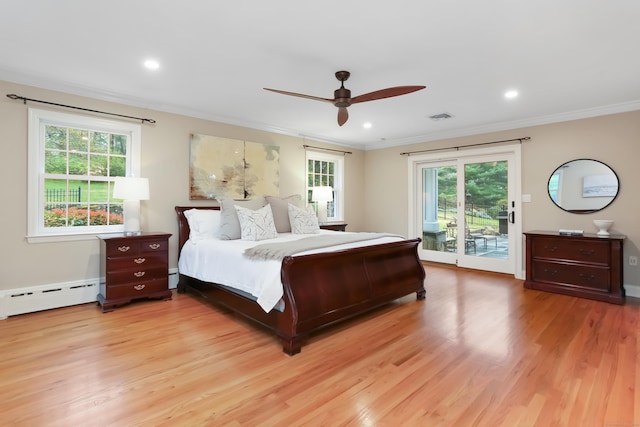 bedroom featuring access to exterior, multiple windows, light wood-style flooring, and visible vents