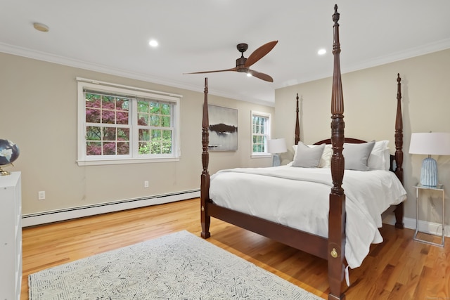bedroom featuring ornamental molding, recessed lighting, wood finished floors, and a baseboard radiator