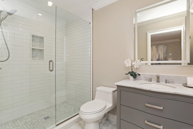 full bathroom featuring a stall shower, toilet, crown molding, and vanity