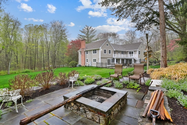 view of patio featuring a fire pit