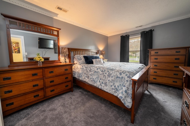 bedroom featuring dark colored carpet, visible vents, and ornamental molding