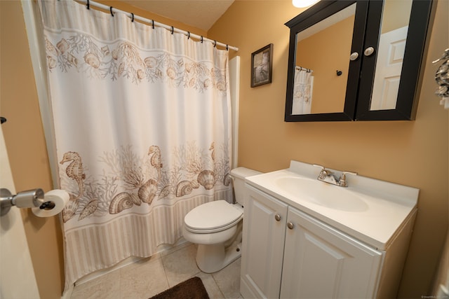 bathroom featuring tile patterned floors, a shower with shower curtain, toilet, and vanity