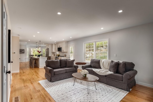 19 Stony Brook Rd, Brookfield, CT 06804 - living area with recessed lighting, a wealth of natural light, and light wood-style flooring