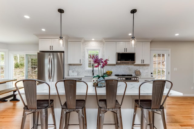 19 Stony Brook Rd, Brookfield, CT 06804 - kitchen with a wealth of natural light, stainless steel appliances, and decorative backsplash
