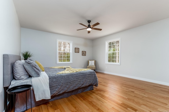19 Stony Brook Rd, Brookfield, CT 06804 - bedroom with a ceiling fan, multiple windows, baseboards, and light wood-type flooring