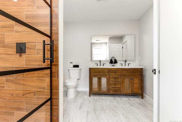 19 Stony Brook Rd, Brookfield, CT 06804 - full bath with double vanity, toilet, baseboards, and a sink