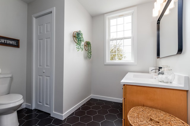19 Stony Brook Rd, Brookfield, CT 06804 - bathroom with toilet, tile patterned floors, vanity, and baseboards