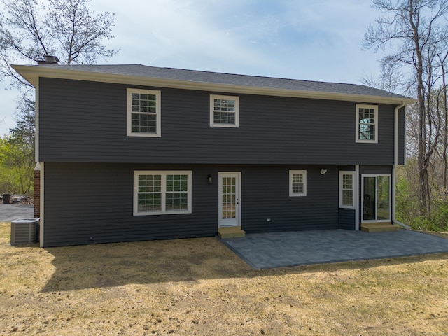 19 Stony Brook Rd, Brookfield, CT 06804 - rear view of house with central air condition unit, a patio area, a yard, a chimney, and entry steps
