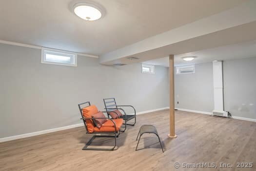 127 Pleasant View Rd, Derby, CT 06418 - basement featuring baseboards and wood finished floors