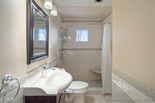 127 Pleasant View Rd, Derby, CT 06418 - full bath featuring tile patterned flooring, a shower stall, toilet, and vanity