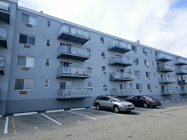 184 Pequot Ave Unit 406, New London, CT 06320 - view of building exterior featuring uncovered parking