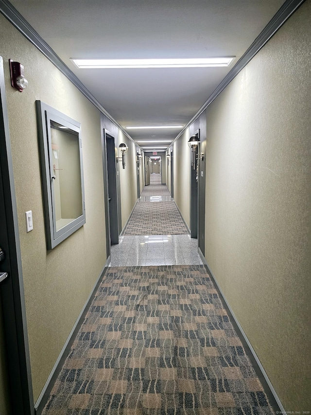 184 Pequot Ave Unit 406, New London, CT 06320 - hall with a textured wall, baseboards, and ornamental molding