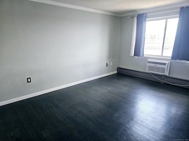 184 Pequot Ave Unit 406, New London, CT 06320 - spare room with dark wood finished floors, an AC wall unit, ornamental molding, baseboards, and a textured ceiling