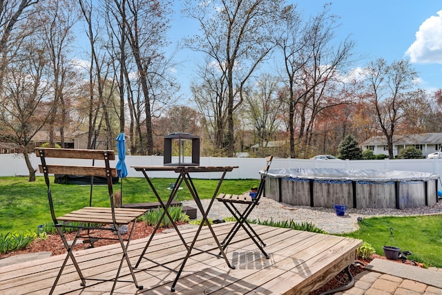 exterior space with fence private yard and a fenced in pool