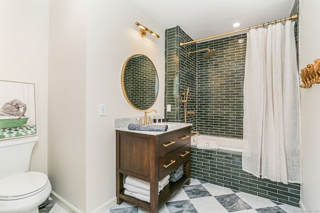 bathroom with recessed lighting, tile patterned flooring, toilet, vanity, and tiled shower / bath combo