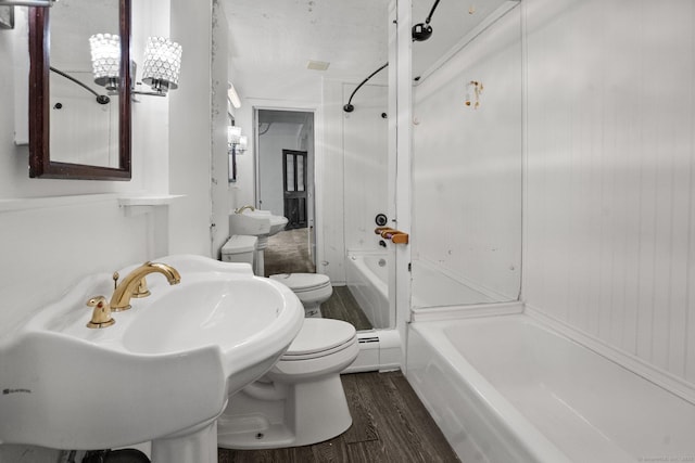 260 Robin St, Bridgeport, CT 06606 - bathroom featuring toilet, wood finished floors, and bathing tub / shower combination