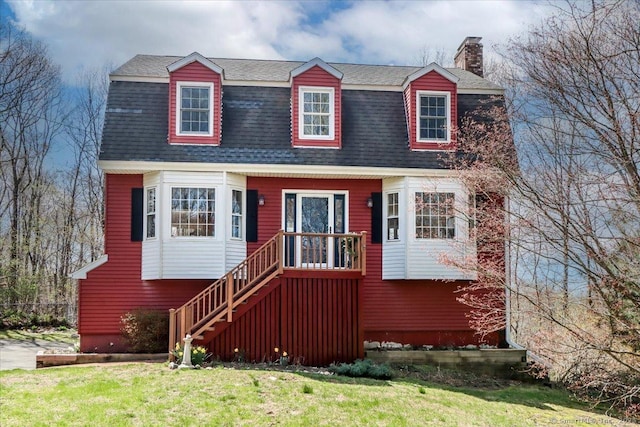 19 Fairchild Rd, Newtown, CT 06470 - colonial inspired home featuring a gambrel roof, a shingled roof, a chimney, and a front lawn