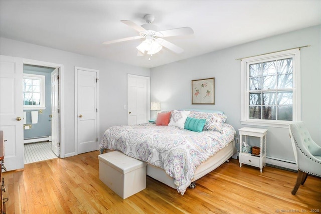 19 Fairchild Rd, Newtown, CT 06470 - bedroom with connected bathroom, a baseboard radiator, ceiling fan, and light wood-type flooring