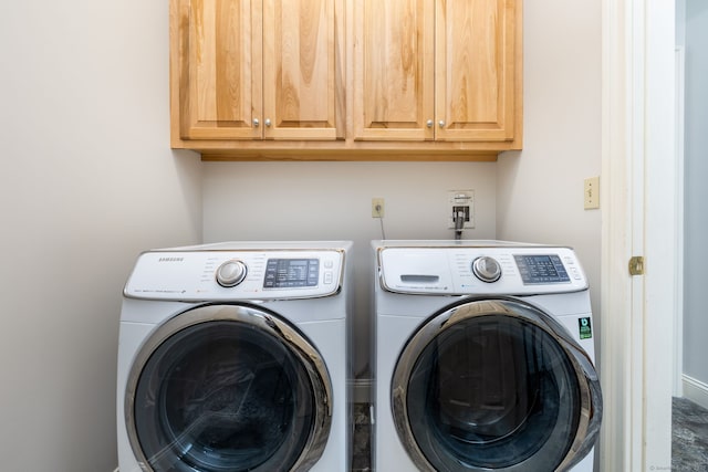 176 Fox Hollow Ln, Bristol, CT 06010 - laundry room featuring separate washer and dryer and cabinet space