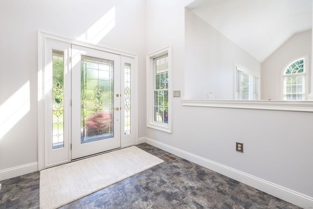 176 Fox Hollow Ln, Bristol, CT 06010 - entrance foyer with vaulted ceiling, baseboards, and stone finish flooring